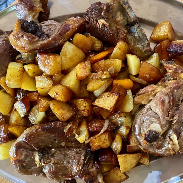 Lamb and potatoes under Peka