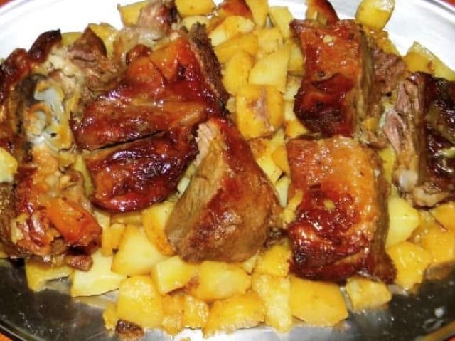 Meat And Potatoes Under Peka