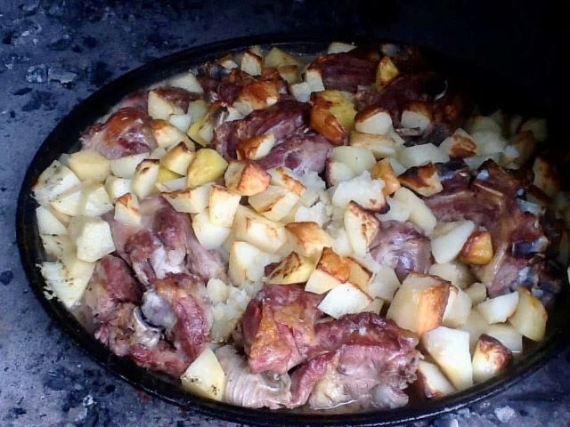 Meat And Potatoes Under Peka