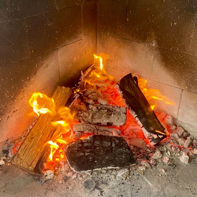 meat and potatoes under peka