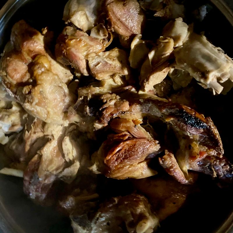 meat and potatoes under peka